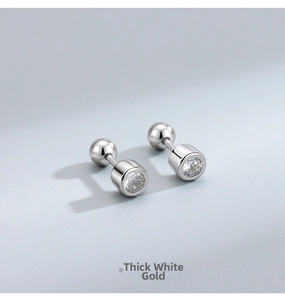 Detailed close-up of S925 silver stud earrings with round cubic zirconia and screw back