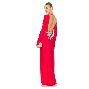 Elegant red backless long-sleeve maxi dress with silver leaf detail on the open back