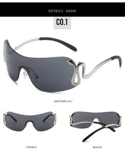Macro view of Y2K wraparound sunglasses featuring silver metal snake detail on grey lenses