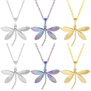 Detail view of dragonfly pendant necklaces in silver, gold, and multicolor finishes