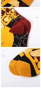 Detail of yellow and red knit socks with Winnie image and anti-slip heel design