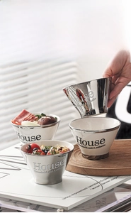 Close-up of luxury ceramic bowl set with silver finish for breakfast and noodle serving