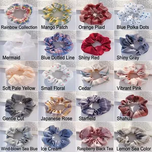 Floral and plaid patterned scrunchie collection with twenty colorful fabric designs