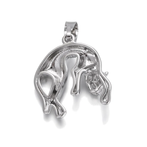 Macro shot of silver leopard pendant with metallic finish for jewelry making