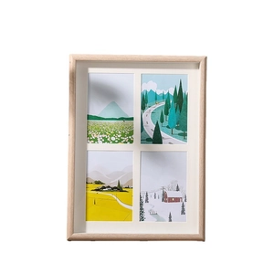 Nordic wooden quad picture frame with light grain finish and four landscape art prints