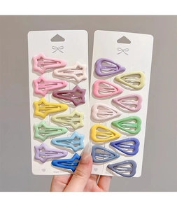 Set of ten colorful star and heart hair clips in matte macaron shades for kids