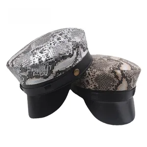 Flat top caps in silver and brown snakeskin pattern with black faux leather brims