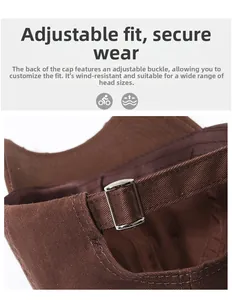 Detail of adjustable silver metal buckle on washed dark brown cotton baseball cap