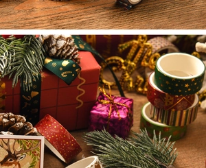 Detail of Christmas washi tape set with festive gold foil on a wooden holiday background