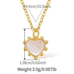Detail showing dimensions of heart-shaped gold necklace with mother of pearl inlay