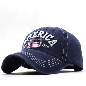 Distressed dark blue baseball cap featuring white 3D America embroidery and flag patch