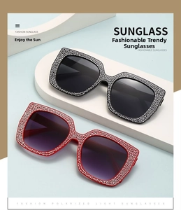 Detail of polarized lenses and luxury rhinestone crystal frame on square sunglasses