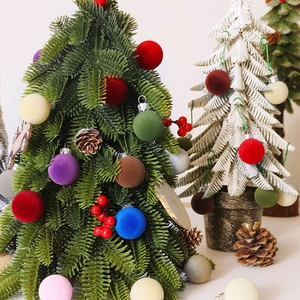 Velvet 3cm Christmas ball ornaments in multiple colors hanging on a green Xmas tree