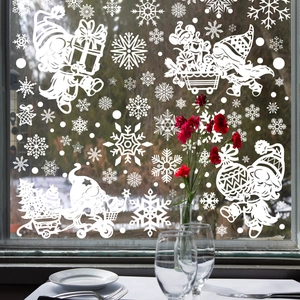 White Christmas window decals with snowflakes and gnomes for glass party decoration