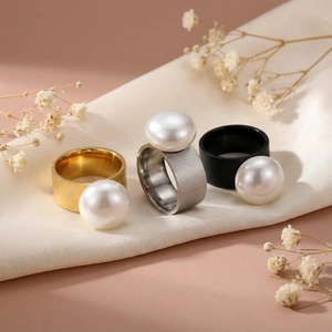 Three elegant wide band pearl rings in gold silver and black with brushed metal finish