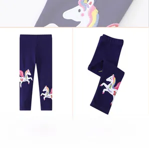 Detailed close-up of unicorn embroidery on navy blue spring leggings for girls