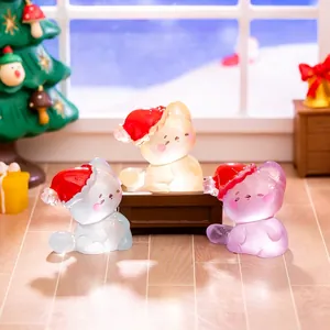 Three mini resin Christmas cat figurines with red hats for micro landscape decoration