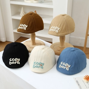 Kids cotton beret hat with Capy embroidery available in five neutral colors