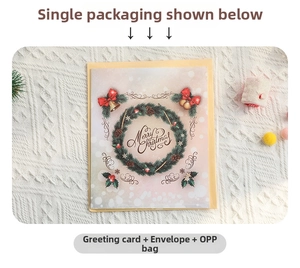 3D Christmas card set with envelope and decorative wreath on warm knitted texture
