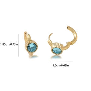 Detail showing 18K gold-plated stainless steel hoop earrings with blue zircon inlays
