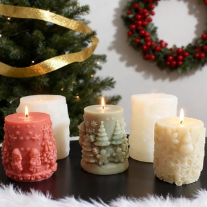 Christmas embossed pillar candle molds featuring reindeer, snowman and snowflake designs