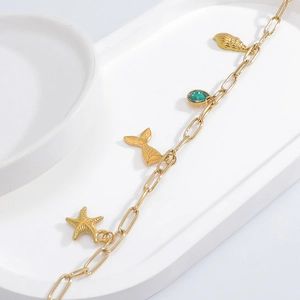 18K gold plated stainless steel bracelet with starfish charms and green gemstone
