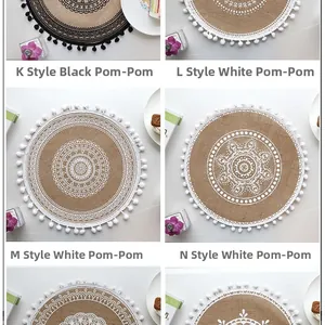 Detail of round jute placemats with decorative pom-poms and mandala style prints