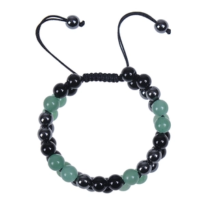 Detail of adjustable double-layer green aventurine and black magnetic stone beaded bracelet