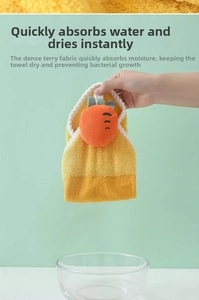 Detail of carrot-shaped hanging hand towel made of thick absorbent coral fleece material