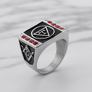 Detail view of Masonic ring with red rhinestones on polished silver stainless steel
