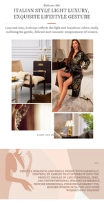 Close-up of black silk robe with gold floral prints and belted waist in luxury setting