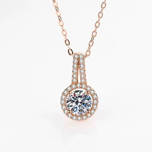 2ct round moissanite pendant necklace in rose gold finish with paved zircon halo