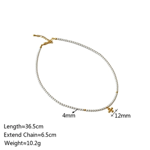 Detail view of 4mm pearl necklace with a 12mm golden floral pendant and sizing specs
