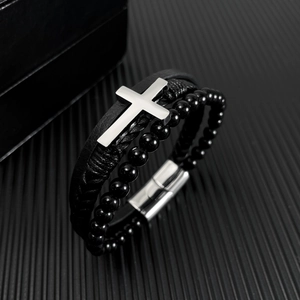 Men's multilayer braided leather bracelet with silver cross charm and magnetic clasp