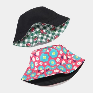 Reversible bucket hat with floral patterns and solid colors for outdoor sun protection