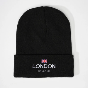 Black London England knit beanie hat featuring embroidered Union Jack flag for winter warmth
