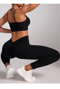Detail of high-waist V-shape back yoga pants and leggings showing lifting effect