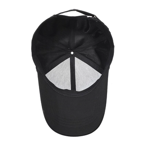 Inside view of a black cotton baseball cap featuring adjustable metal strap and stitching