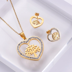 Golden heart jewelry set with tree of life design and sparkling white rhinestones