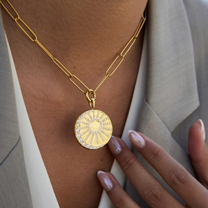 Classic 18K gold plated stainless steel paperclip necklace with sunburst pendant and crystals