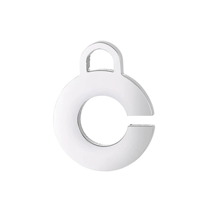 Macro detail of polished stainless steel C-shaped open ring pendant with smooth finish