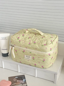 Quilted tulip floral makeup bag with yellow fabric and top handle storage organizer