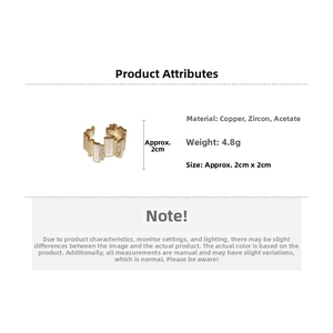 Detail view of gold geometric ring featuring rectangular acetate and clear zircon stones