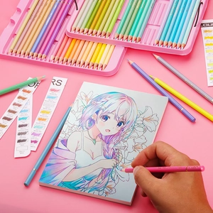 Close-up of hand coloring a manga drawing with professional Macaron colored pencils