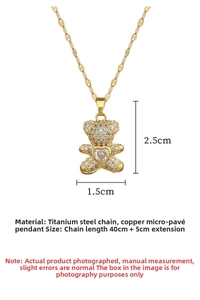 Detailed view of gold teddy bear pendant with zircons and 45cm titanium steel chain