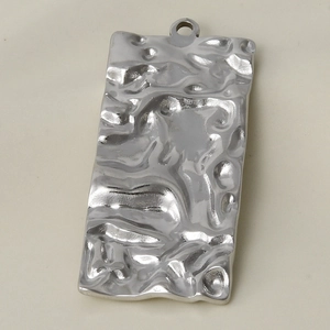 Close-up of silver 304 stainless steel rectangular pendant with hammered water ripple texture