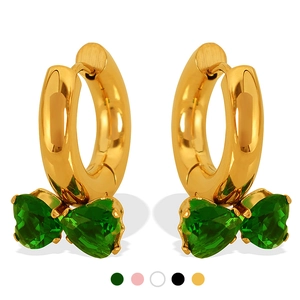 Golden hoop earrings featuring green heart-shaped zircons in a delicate bow design