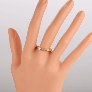 Exquisite gold stainless steel six-prong ring with sparkling accents on model hand
