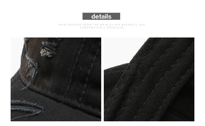 Detail shot of distressed black washed cotton baseball cap with ripped brim and stitching