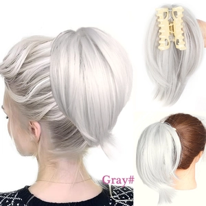 Gray claw clip ponytail hairpiece detail showing model look and inner clip mechanism